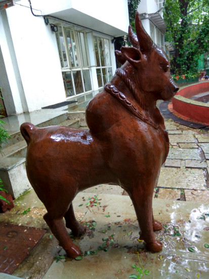 Sculpture of a bull in IDC during the monsoon